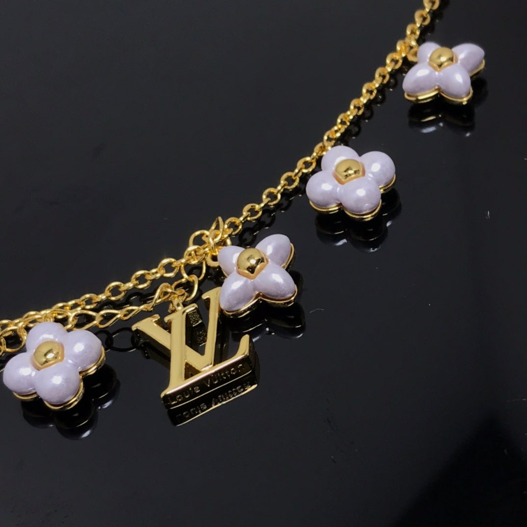 [Vicky]LOGO 6 MOTIF STAR AND SUN GOLD BRACELET