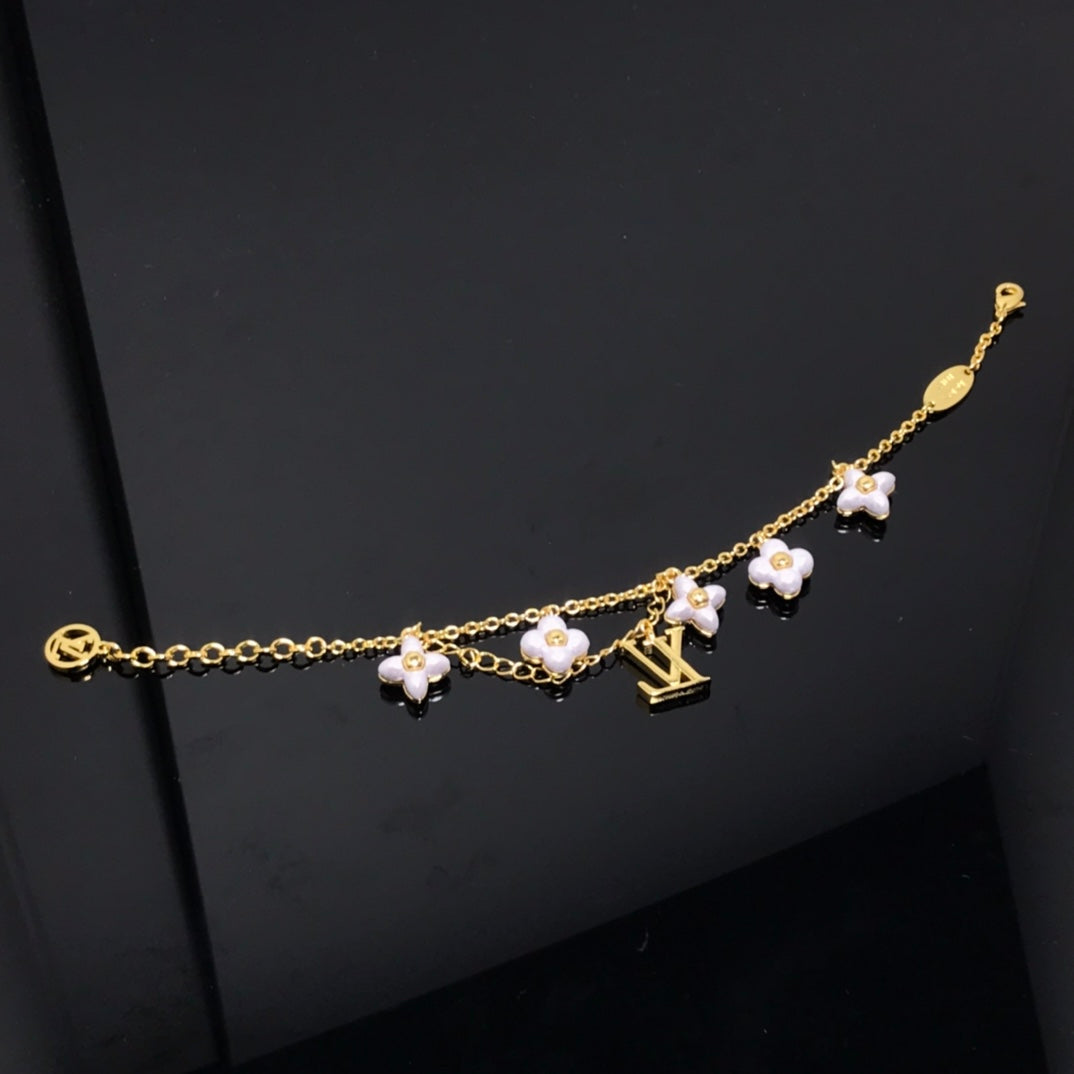 [Vicky]LOGO 6 MOTIF STAR AND SUN GOLD BRACELET